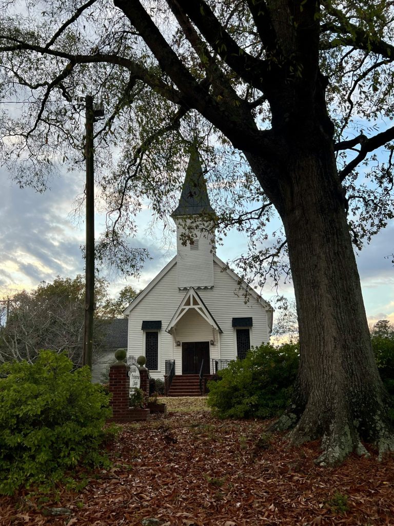 a white building with a steeple
